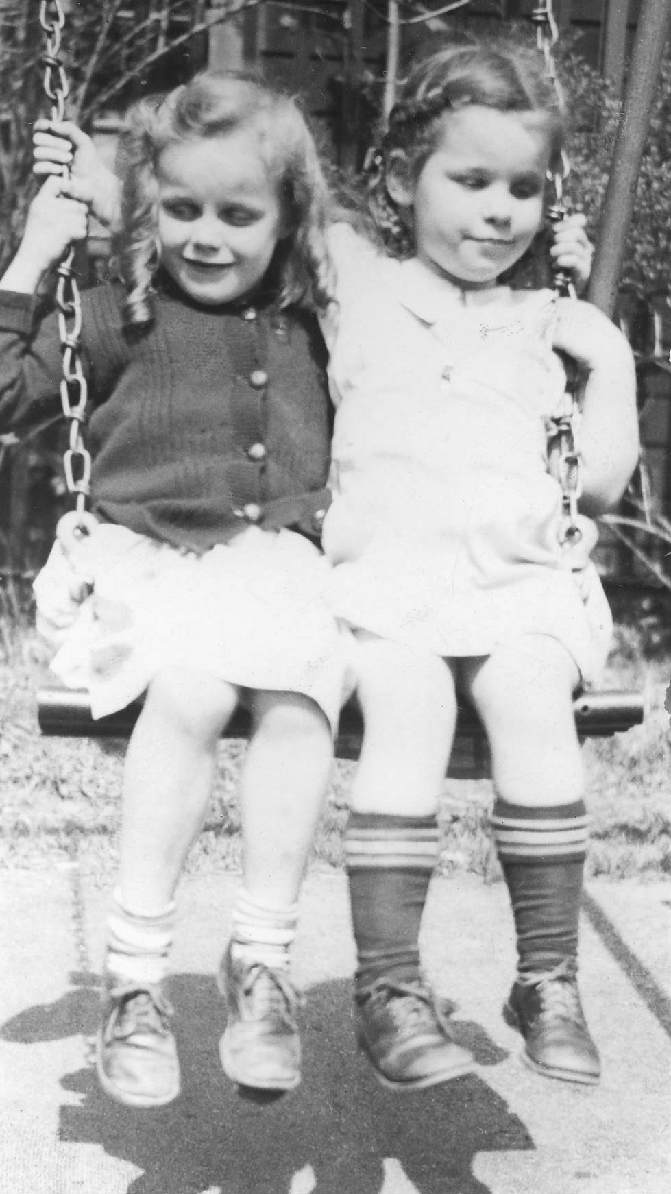 young girls on swing