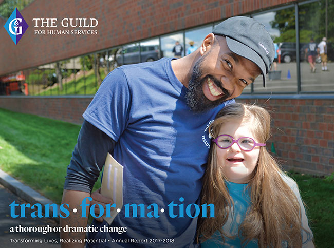 Educator with student outside Guild building