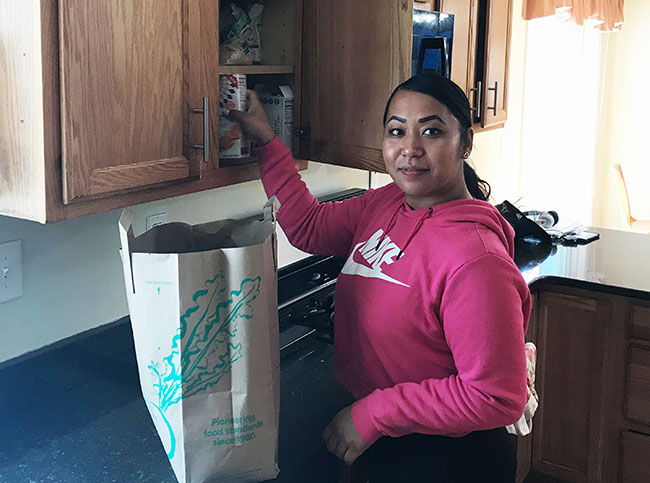 Woman working in kitchen