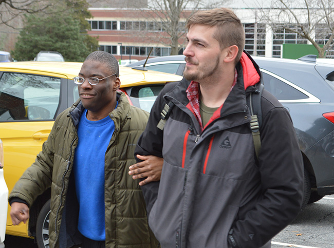 Teacher walks with a student