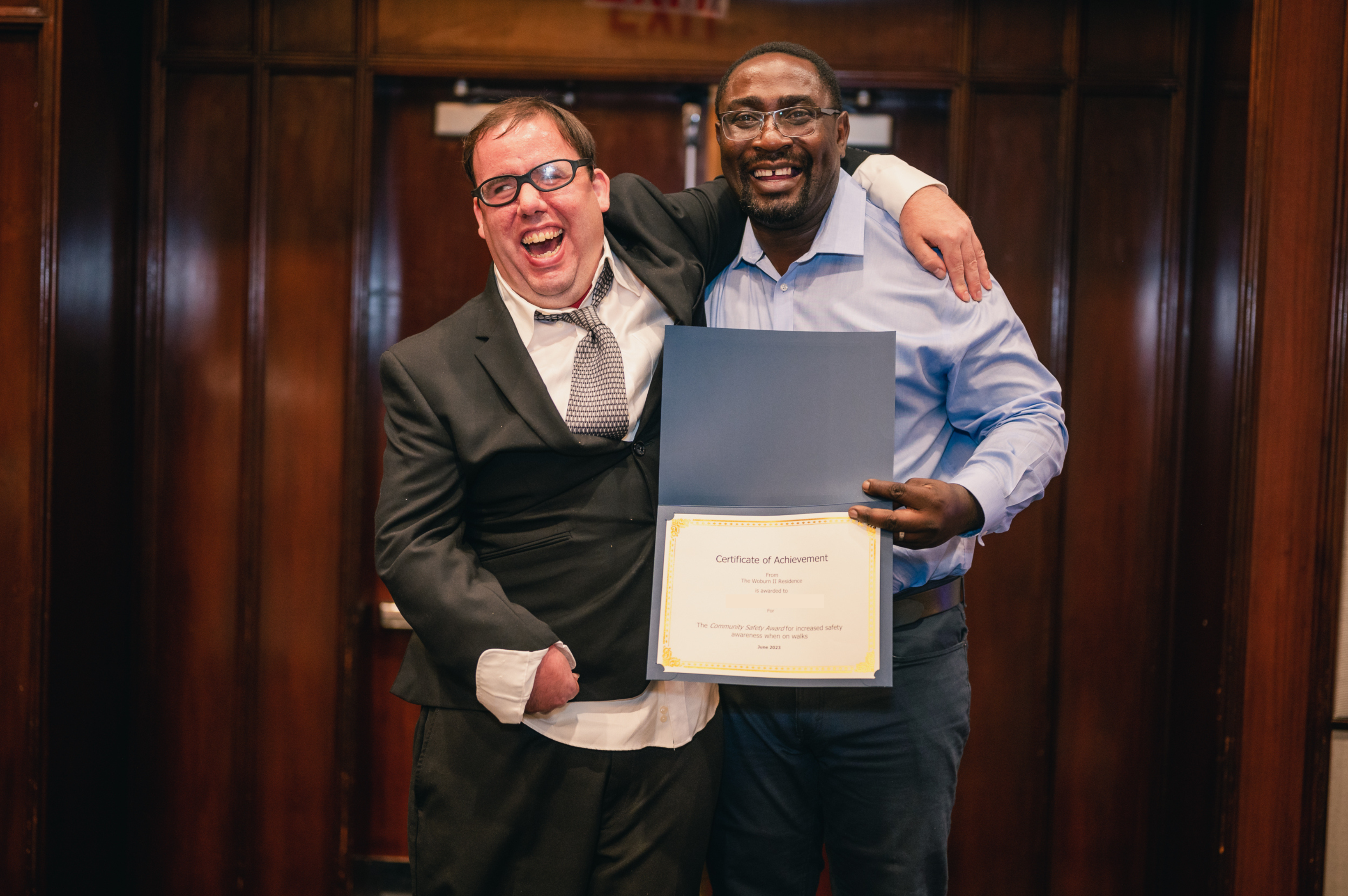 Adult and staff member at Guild Awards Ceremony