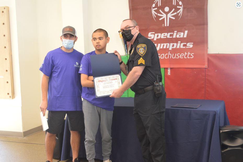 Thomas Lucia, Guild for Human Services with a Guild School student and Concord Police Sergeant Tim Landers