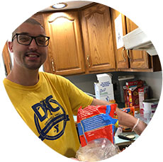 Adult resident cooking dinner