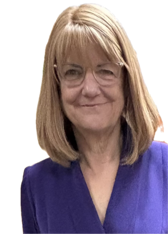 Peg Doherty is smiling and wearing a navy blue top and glasses.